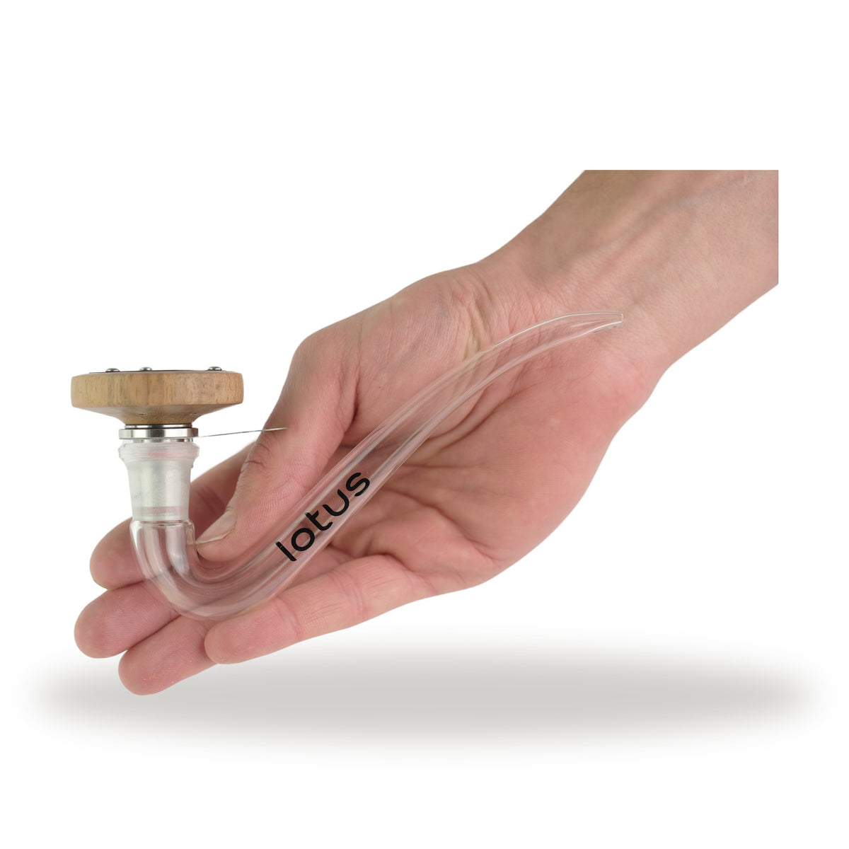 INHALE Lotus mit Vapor Cap aus Walnuss auf der Glaspfeife in der Hand